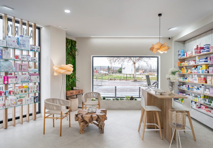 Zona relax e consultazione in farmacia moderna. Inside Pharmacy.